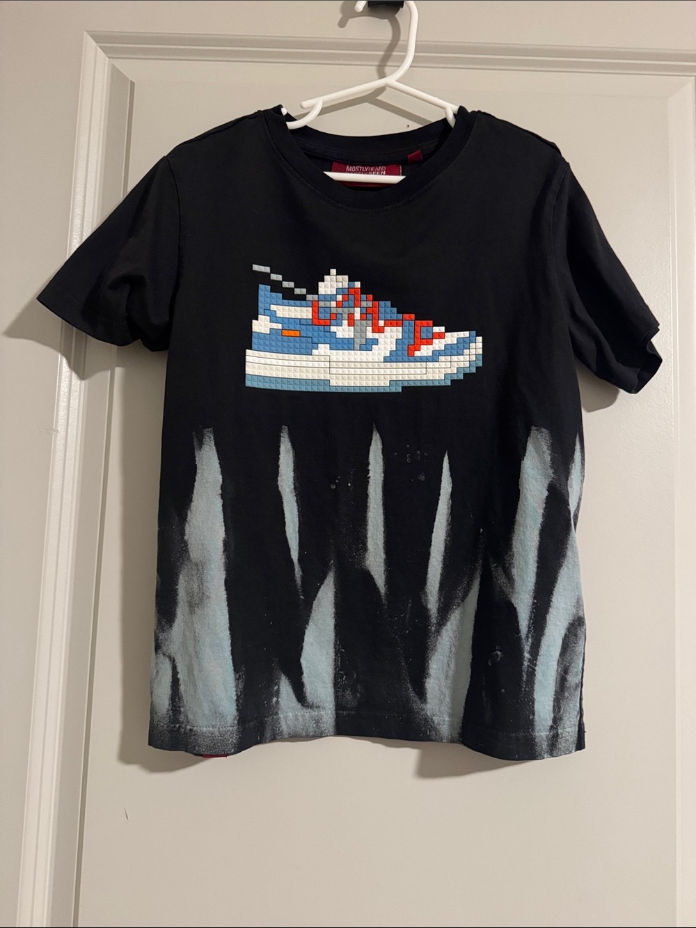 Mostly Heard Rarely Seen Black Tee with Blue & Red Sneaker Graphic